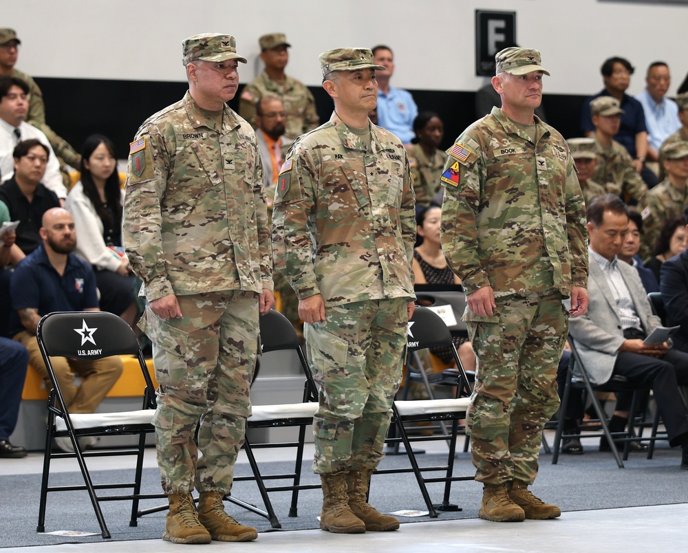 403rd AFSB commander Col. Henry Brown relinquishes command to Col. Jason Book in change of command ceremony