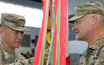 403rd AFSB commander Col. Henry Brown relinquishes command to Col. Jason Book in change of command ceremony