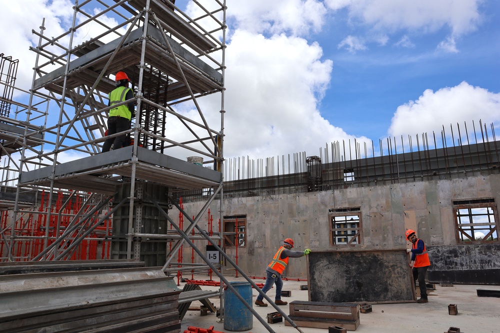 Construction Workers Build Columns for a Building Under Construction on Camp Blaz