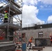 Construction Workers Build Columns for a Building Under Construction on Camp Blaz