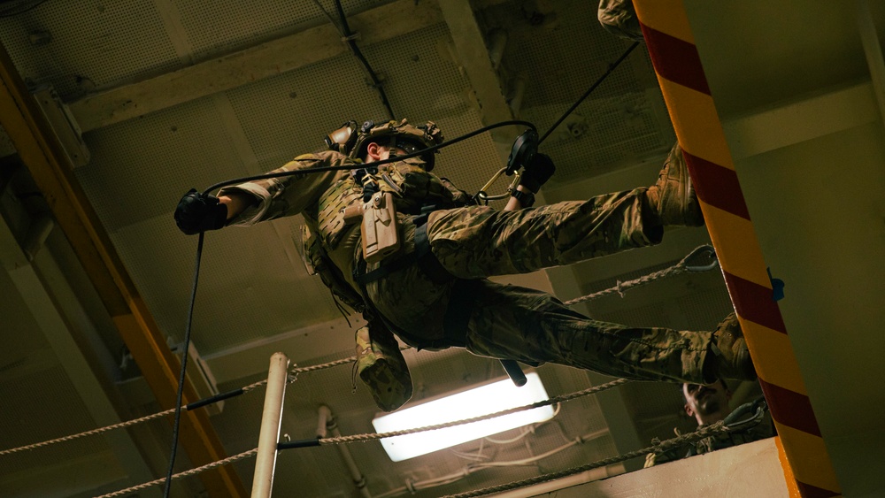 EODMU 5 Sailors Conduct Fast Rope Drills