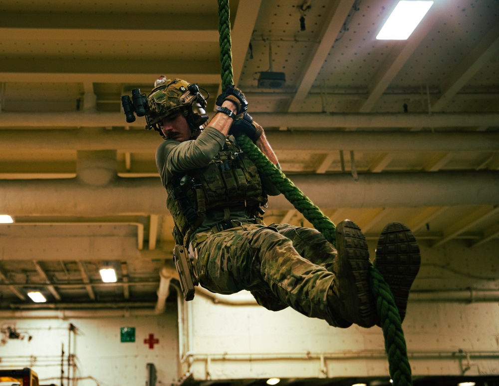 EODMU 5 Sailors Conduct Fast Rope Drills