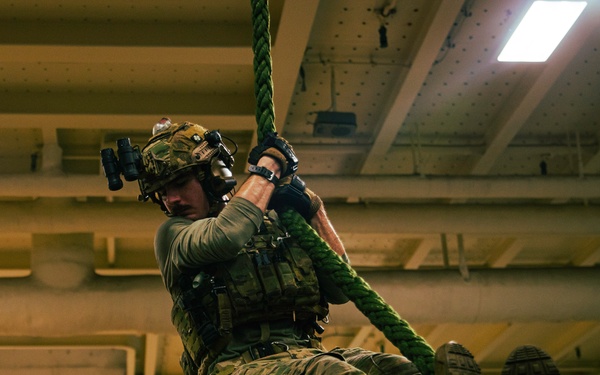 EODMU 5 Sailors Conduct Fast Rope Drills
