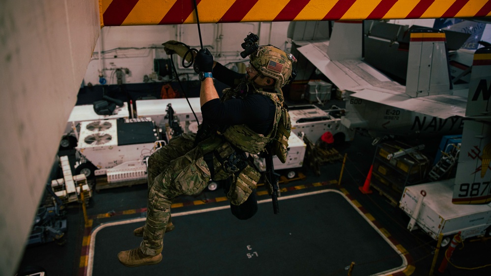 EODMU 5 Sailors Conduct Fast Rope Drills