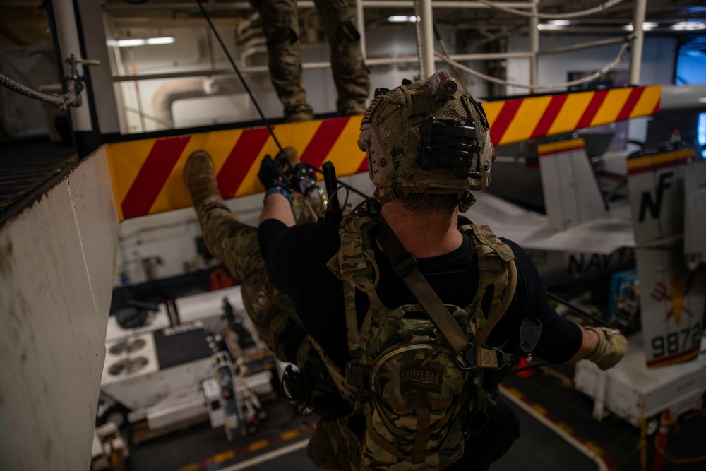 EODMU 5 Sailors Conduct Fast Rope Drills