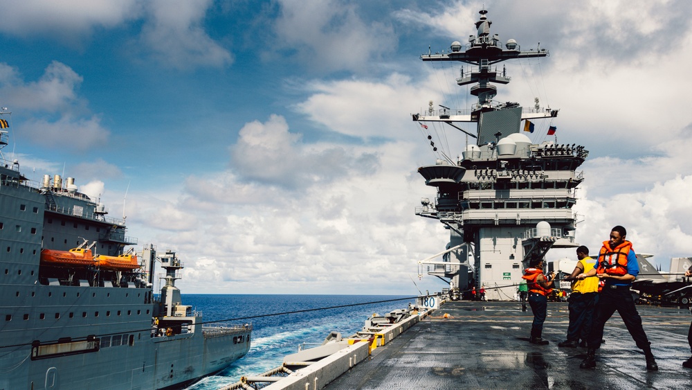 George Washington Sailors Conduct Replenishment-at-Sea with Alan Shepard