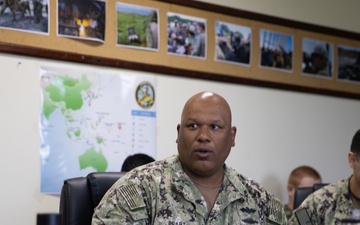 30 NCR Commodore Visits NMCB 4