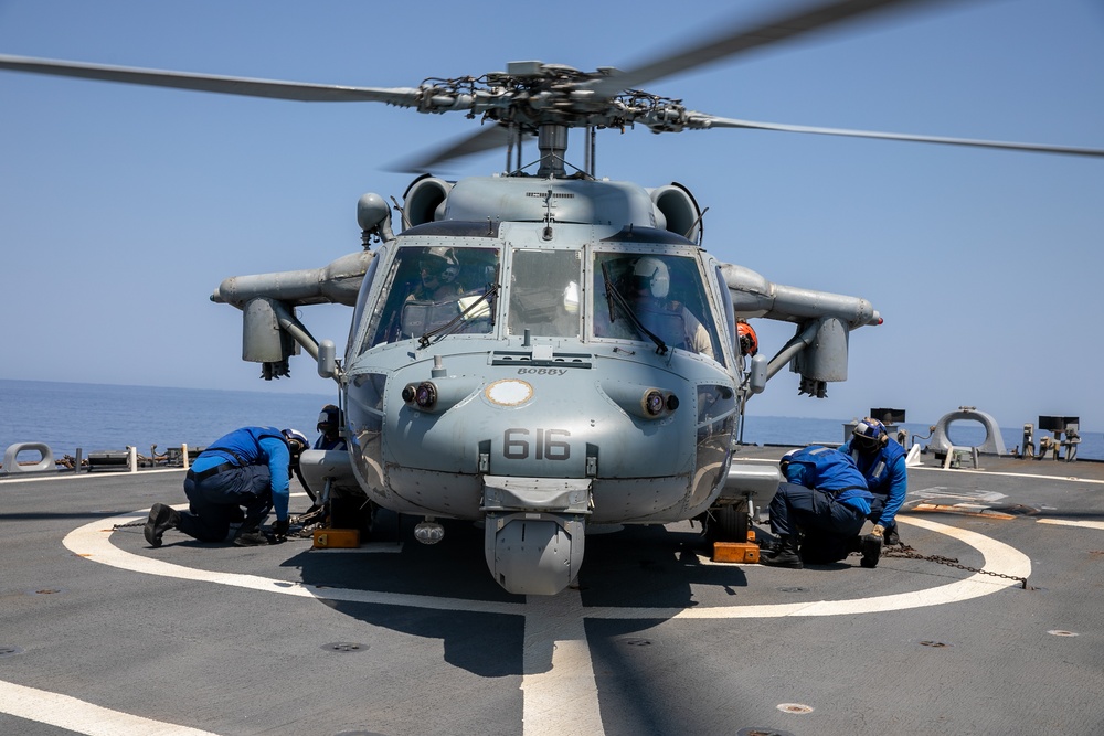 USS Mitscher (DDG 57) Sailors conduct flight quarters with HSC 9