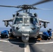 USS Mitscher (DDG 57) Sailors conduct flight quarters with HSC 9