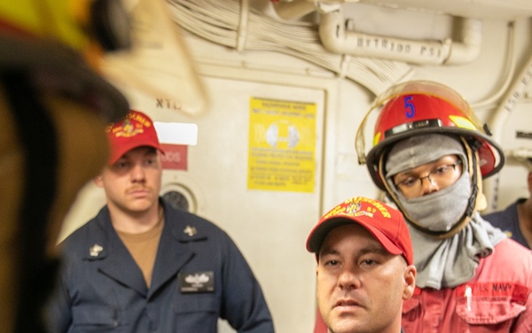 USS Mitscher (DDG 57) Sailors conduct damage control training
