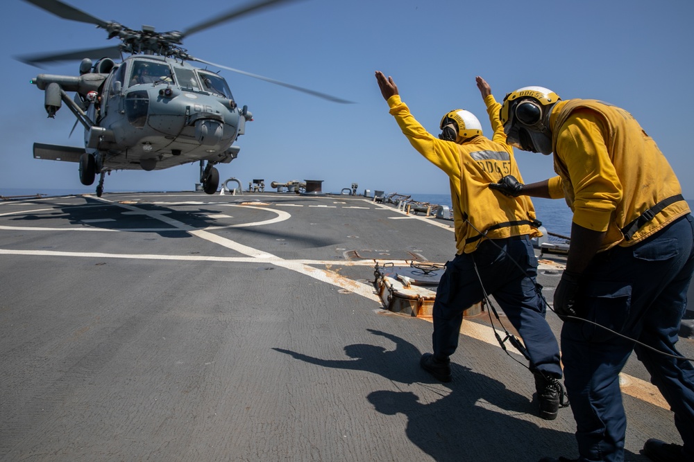 USS Mitscher (DDG 57) Sailors conduct flight quarters with HSC 9