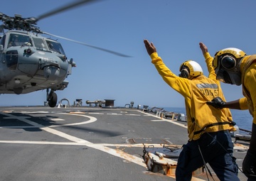 USS Mitscher (DDG 57) Sailors conduct flight quarters with HSC 9