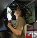 VFA-213 Sailor Conducts Maintenance