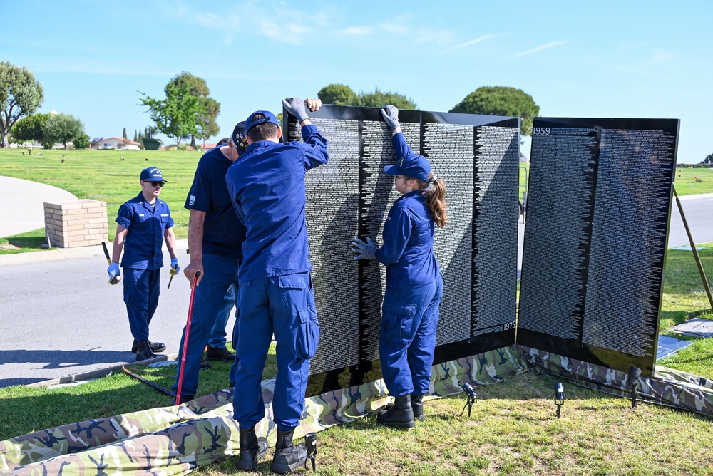 U.S. Coast Guard members assemble The Moving Wall
