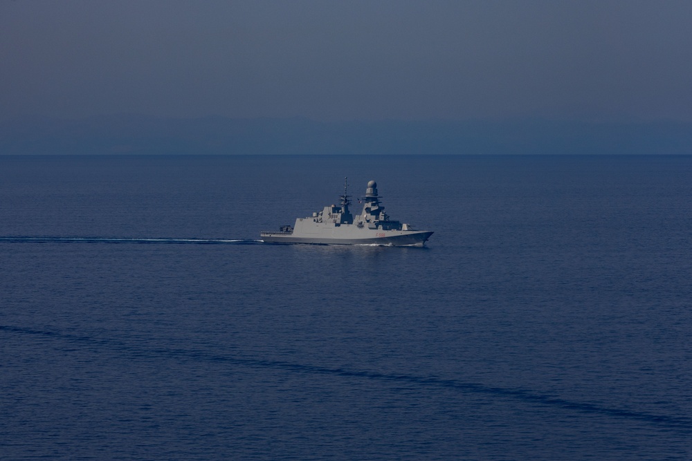USS Gerald R. Ford (CVN 78) Sails Alongside ITS Spartaco Schergat (F 598)