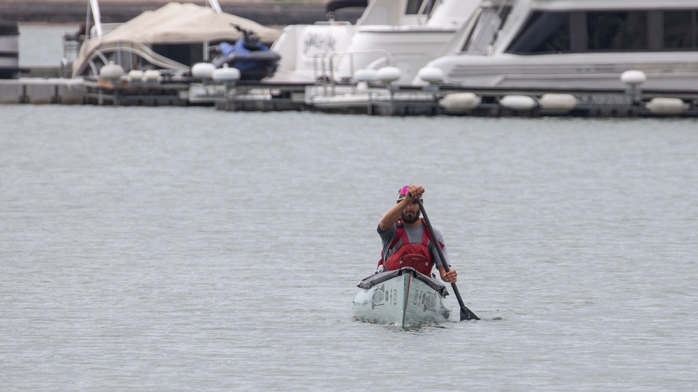 Garrison Dam team meets a paddling pal