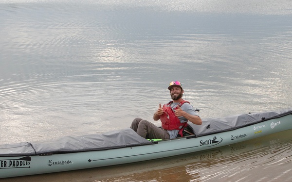 Garrison Dam team meets a paddling pal