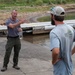 Garrison Dam team meets a paddling pal