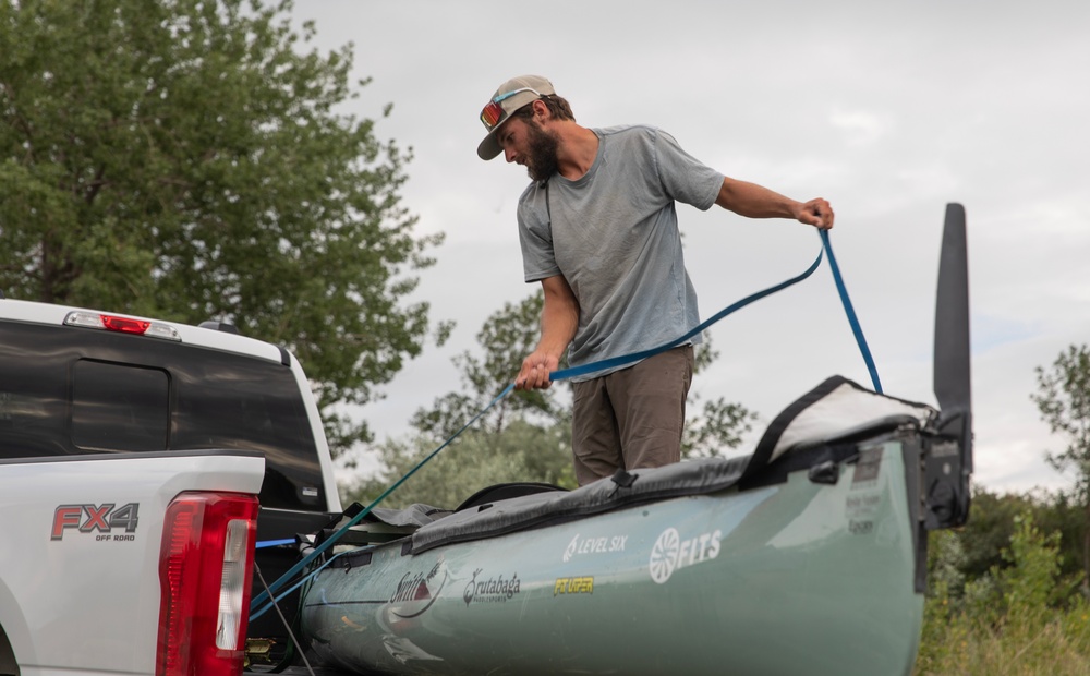 Garrison Dam team meets a paddling pal