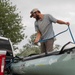 Garrison Dam team meets a paddling pal