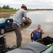 Garrison Dam team meets a paddling pal