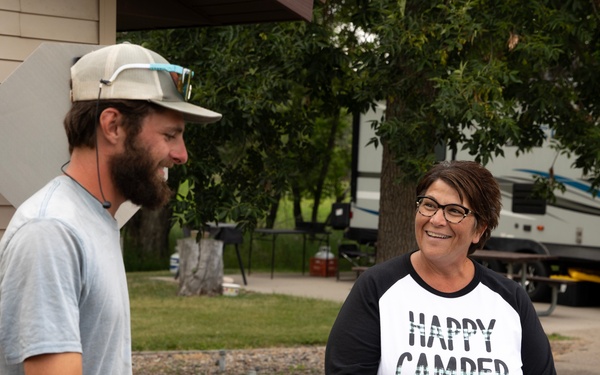 Garrison Dam team meets a paddling pal