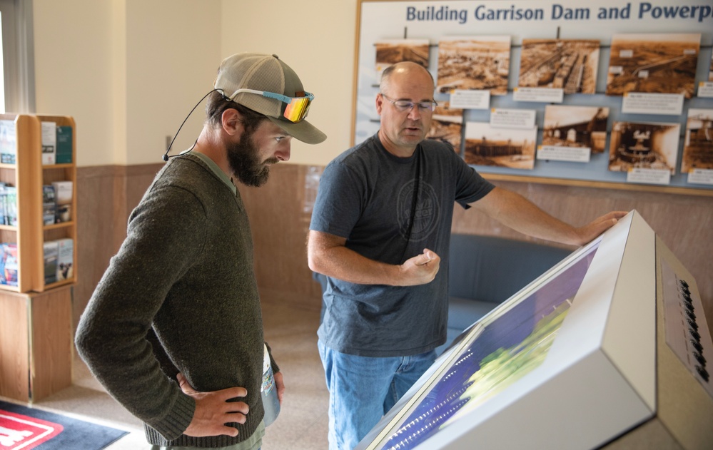 Garrison Dam team meets a paddling pal