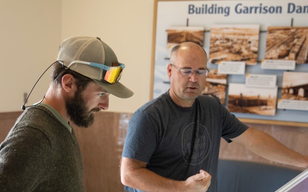 Garrison Dam team meets a paddling pal