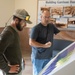 Garrison Dam team meets a paddling pal