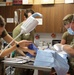 Army Reserve Soldiers provide veterinary services for the local community during Health Broome