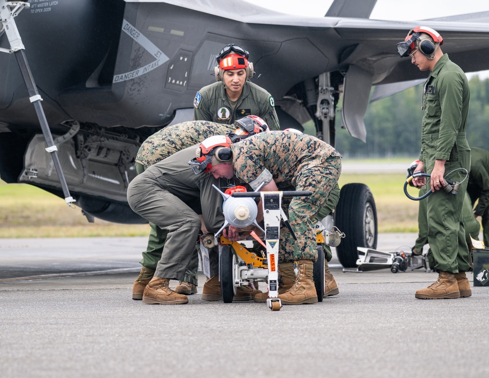 U.S. Marines load ordnance during ULT