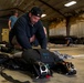 NSWG2 personnel prepare parachutes for AE25