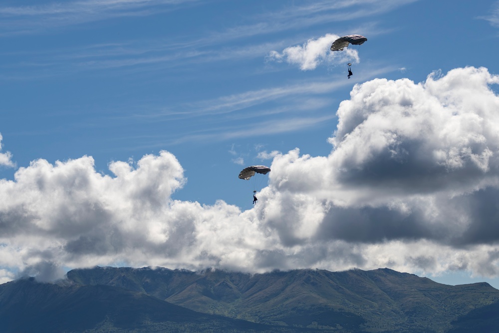 U.S. Navy SEALs execute military free fall during AE25