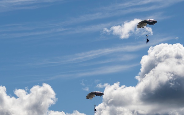 U.S. Navy SEALs execute military free fall during AE25