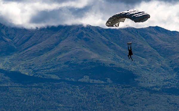 U.S. Navy SEALs execute military free fall during AE25