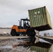U.S. Marines receive cargo from USNS Guam