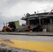 U.S. Marines receive cargo from USNS Guam