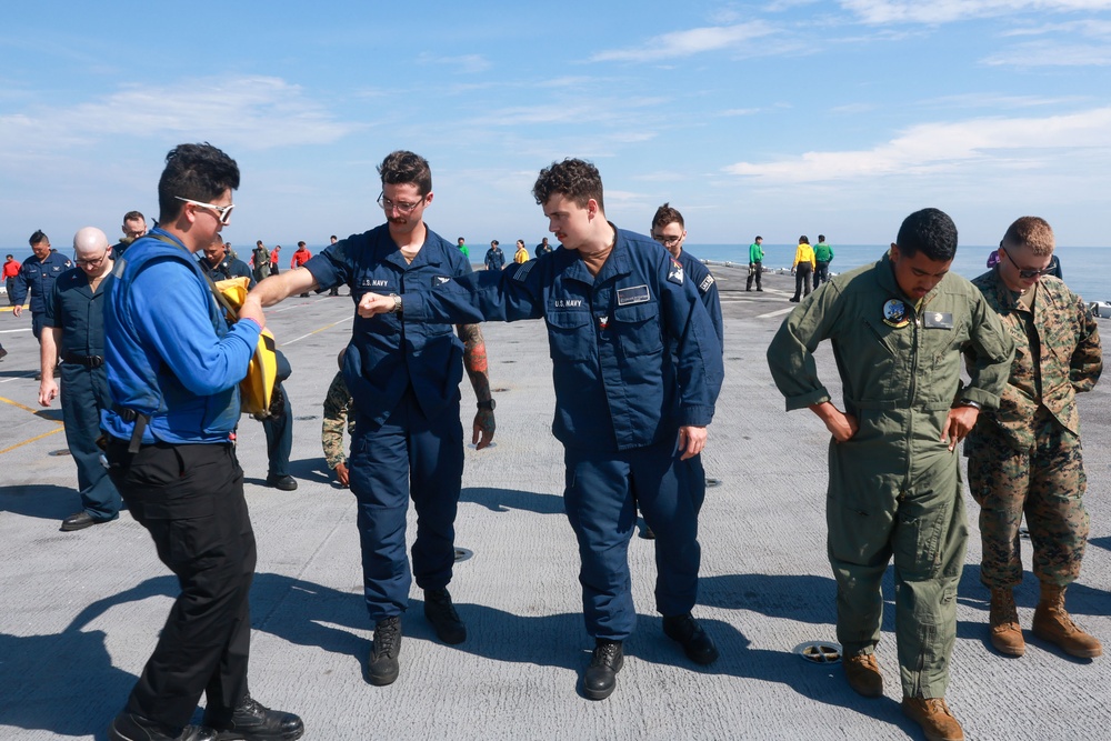 Iwo Jima Sailors and Marines Conduct Foreign Object Debris Walkdown