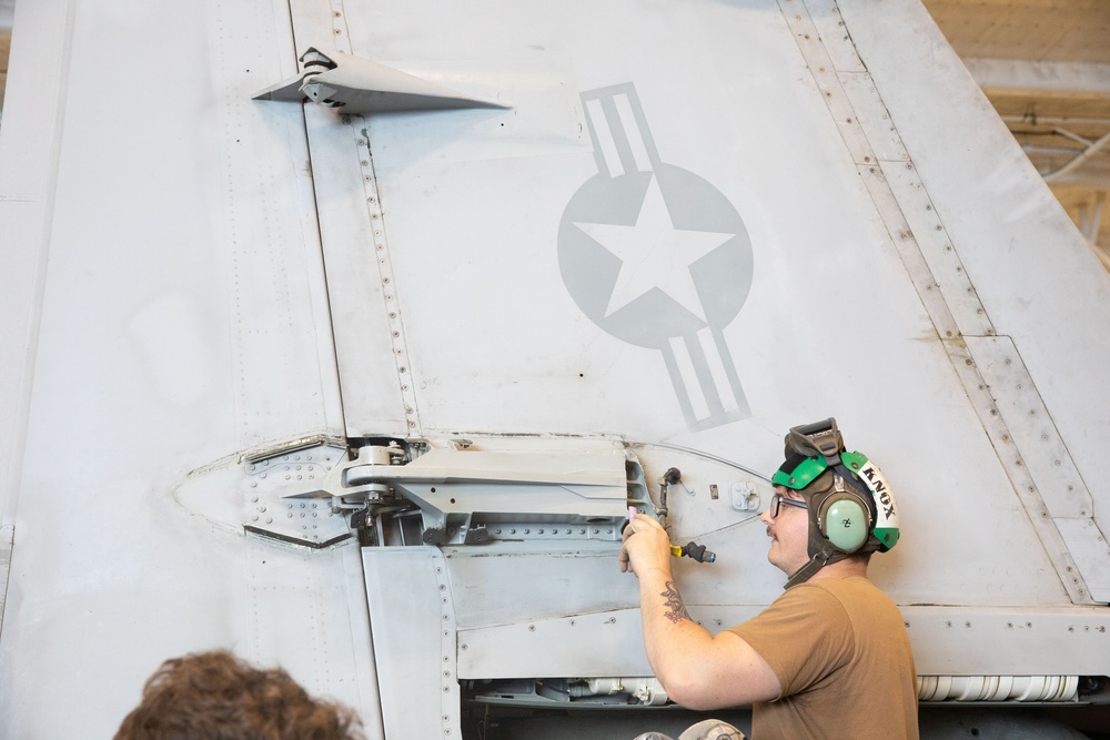 VFA 31 Sailor Conducts Maintenance