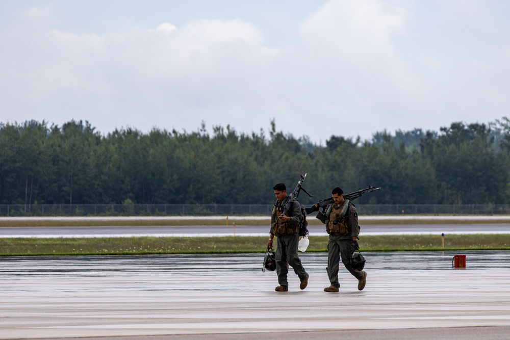 HMLA-775 Coyotes conduct flight line operations in the rain