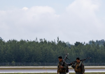 HMLA-775 Coyotes conduct flight line operations in the rain