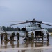 HMLA-775 Coyotes conduct flight line operations in the rain