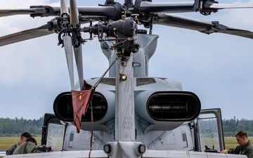 HMLA-775 Coyotes conduct flight line operations in the rain