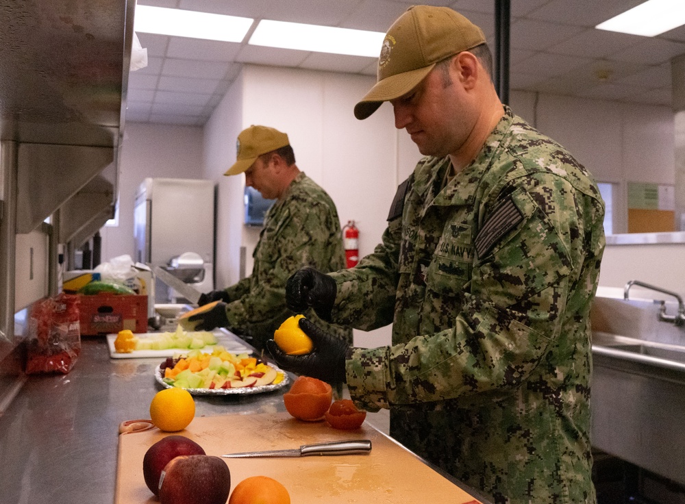 Culinary Specialists Prepare Fruit