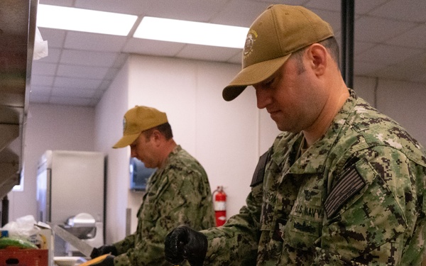 Culinary Specialists Prepare Fruit