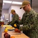 Culinary Specialists Prepare Fruit