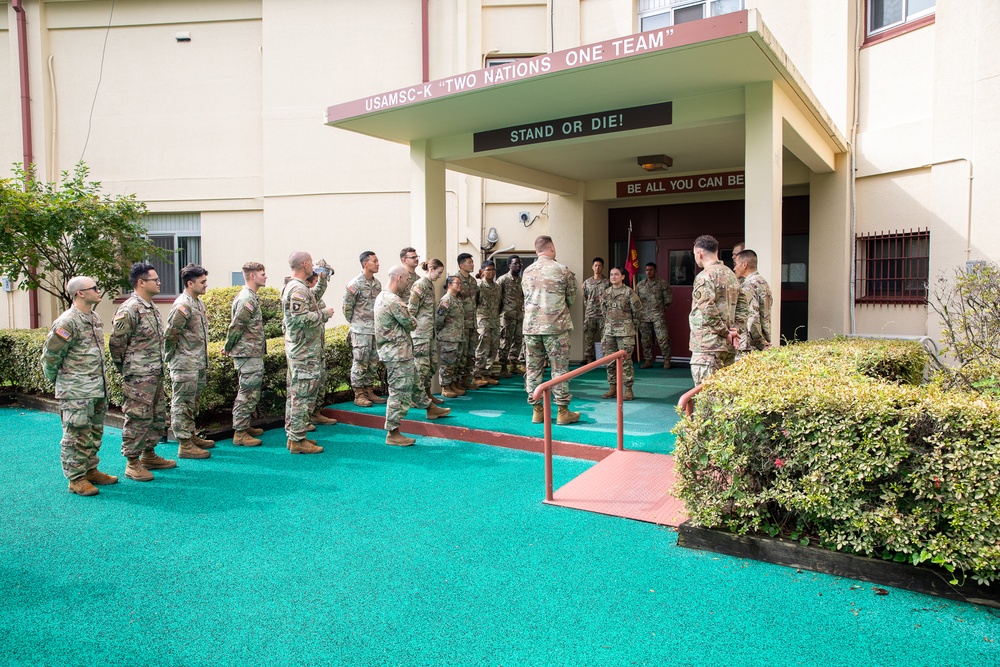 Sgt. Spencer A. Kuzara (498th CSSB) and Cadet Angelina Munoz were awarded a Brigade coin today by Col. R. Scott Carpenter, commander of U.S. Army Materiel Support Command–Korea.