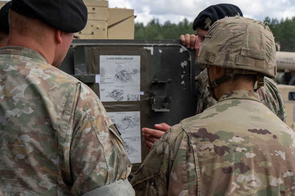 3rd Infantry Division Soldiers Conduct Preventative Maintenance Checks and Services With Lithuanian Army