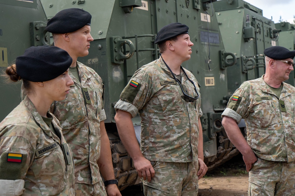 3rd Infantry Division Soldiers Conduct Preventative Maintenance Checks and Services With Lithuanian Army