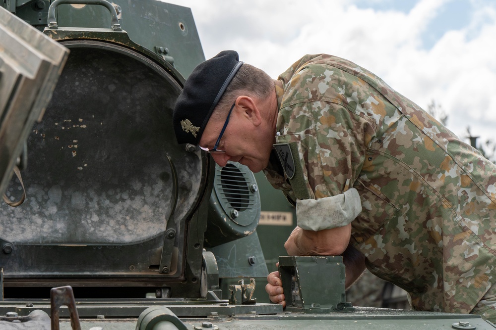 3rd Infantry Division Soldiers Conduct Preventative Maintenance Checks and Services With Lithuanian Army